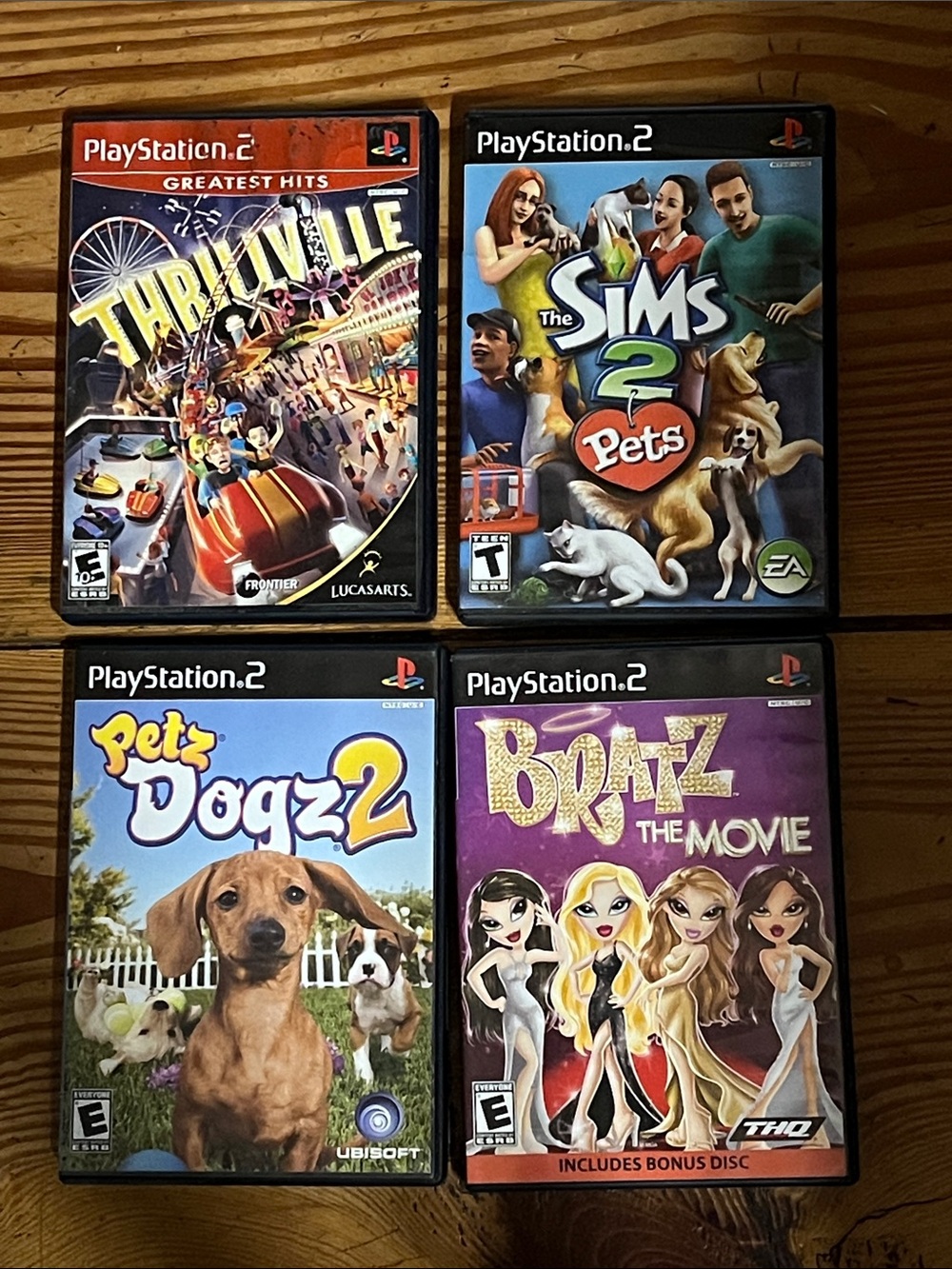 Sony PlayStation 2 Game Set.  Thrillville, Bratz, Petz Dogz2, The Sims 2 Pets